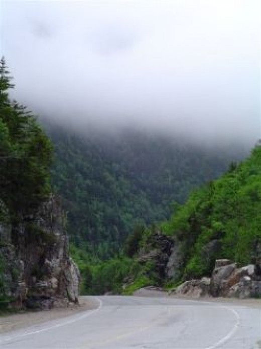 Curving road though mountains photo